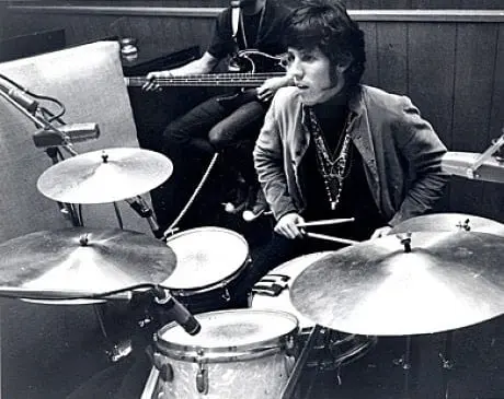 John Paul Densmore, the drummer for The Doors, sitting behind his drumkit.
