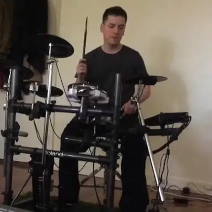 Daniel playing drums